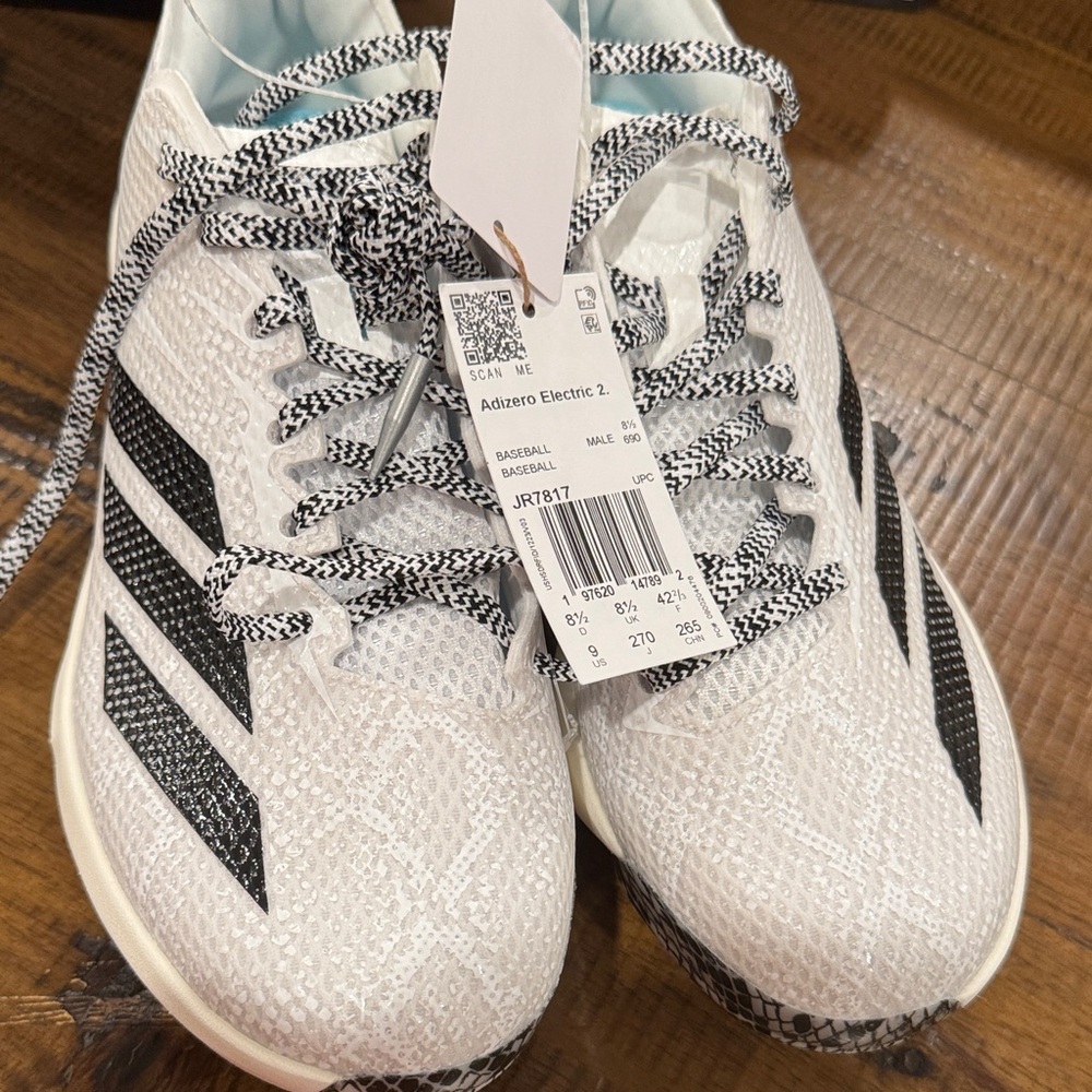 Adidas Men's White Athletic Shoes with Black Stripes